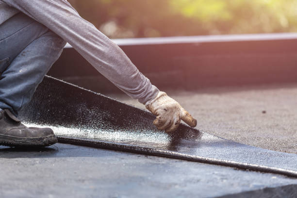 Professional Waterproofing technician working in Adelphi, MD